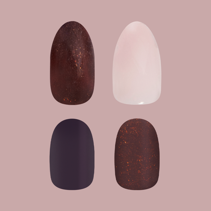 Four medium oval and short round false nails in deep and light fall tones from the Fall Press-On Set