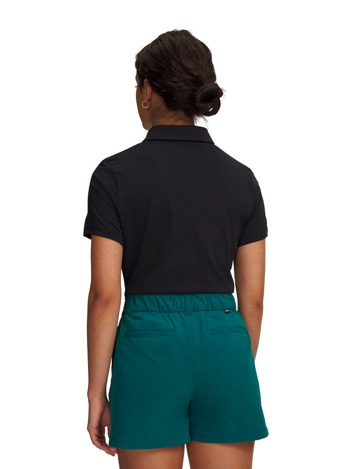 UA Drive Polo negro para mujer
