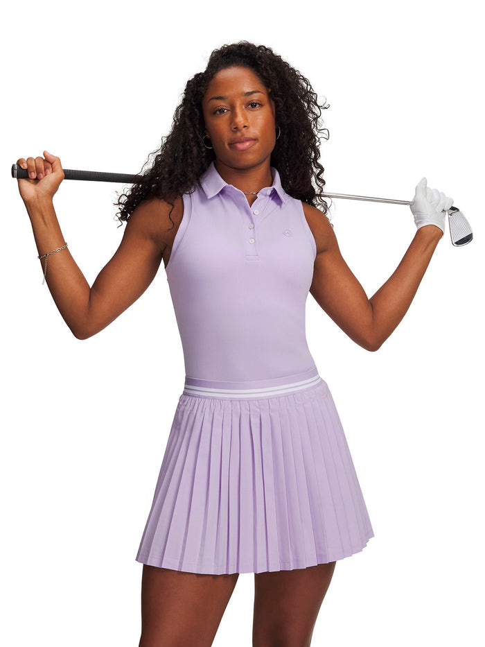 UA Drive Polo morado para mujer